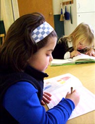 child reading montessori guelph